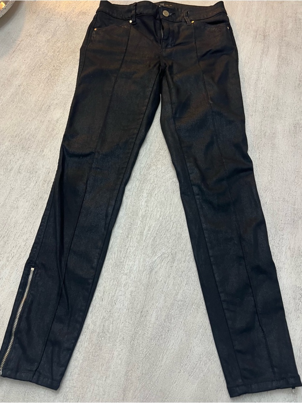 White House Black Market Black Skinny Jeans with Zip Hem